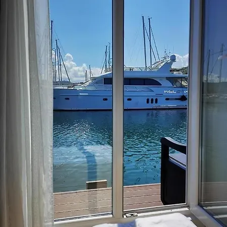 Botel Stella Blue Floating House